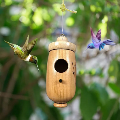 Wooden hummingbird house by Belro, decorated with nature-inspired details, perfect for garden or outdoor decor.