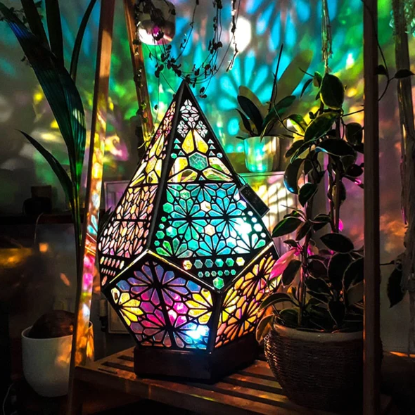 Colorful Bohemian projection night light by Belro illuminating a room with vibrant, swirling patterns and soft lighting.
