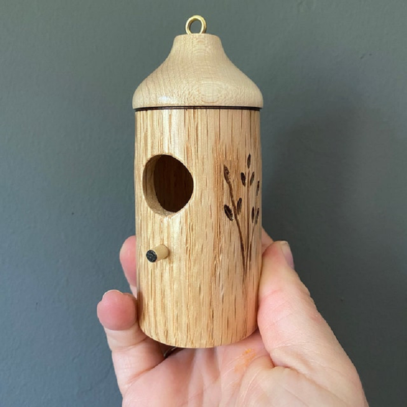 Belro wooden hummingbird house for garden decor, featuring a rustic design ideal for natural lovers and outdoor bird habitats