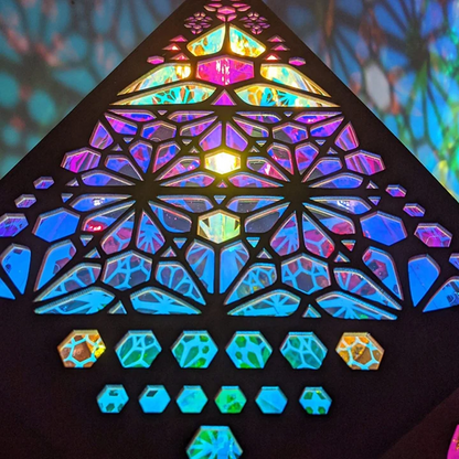 Colorful Bohemian projection night light by Belro, featuring vibrant patterns and soft illumination for cozy bedroom or ambient lighting.