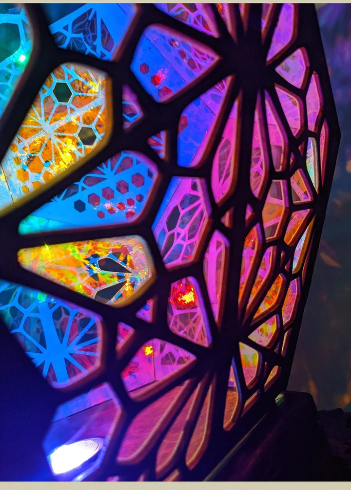 Colorful Bohemian projection night light by Belro, showcasing vibrant patterns and soft illumination for cozy bedroom decor.