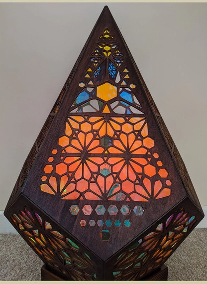 Colorful bohemian projection night light by Belro, illuminating with vibrant patterns for cozy evening ambiance.