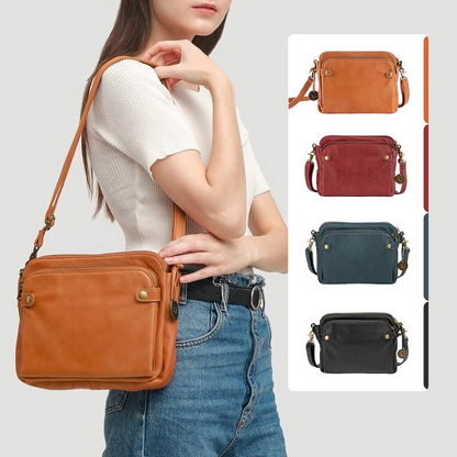 Belro three-layer leather crossbody bag and clutch with adjustable strap, featuring multiple compartments and sleek design.