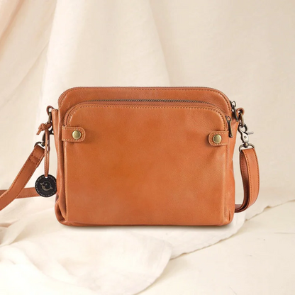 Belro three-layer leather crossbody bag and clutch with adjustable strap, featuring multiple compartments and a sleek design.