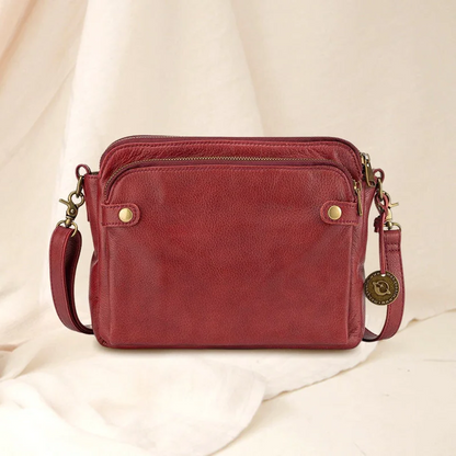Belro three-layer leather crossbody bag and clutch with adjustable strap, featuring multiple compartments and stylish design.