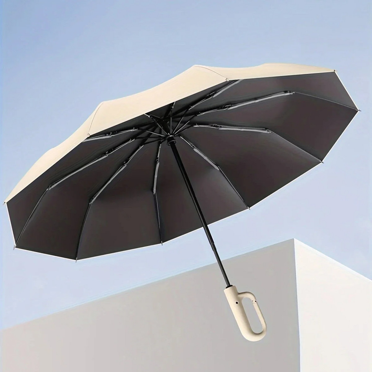 Belro reinforced contemporary compact umbrella with a sleek black canopy, foldable design, and sturdy handle for everyday use.