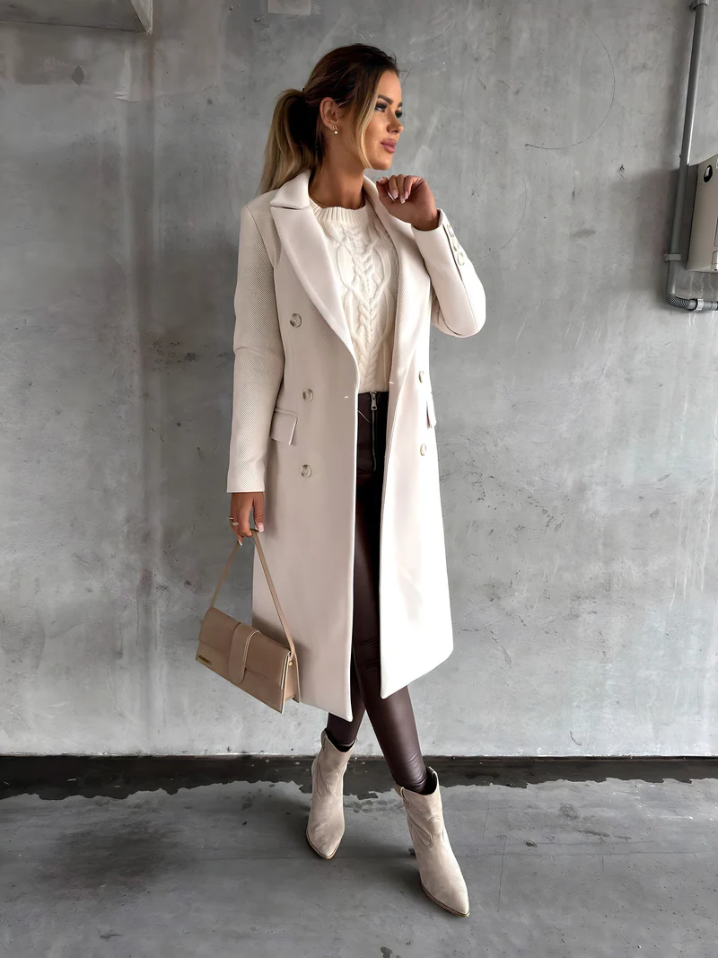 Elegant Belro coat with a timeless style, featuring a classic design and tailored fit, displayed on a mannequin.