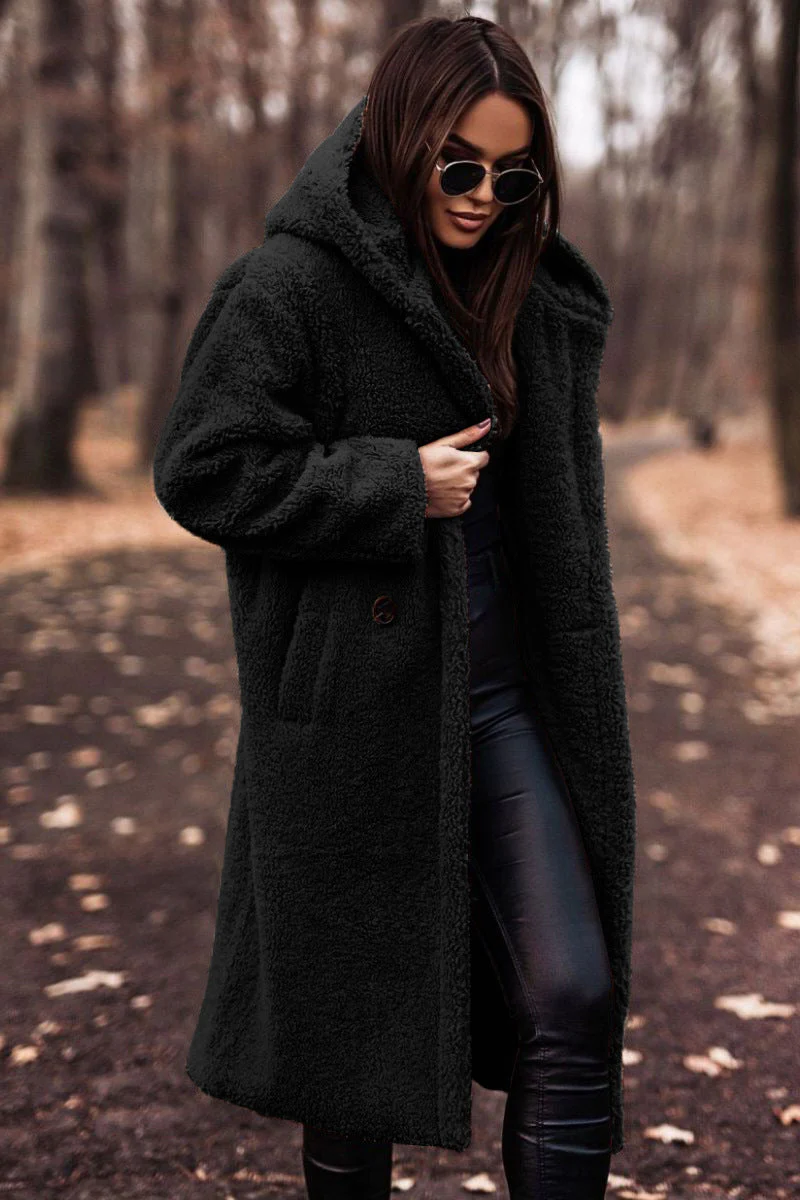 Belro winter coat displayed on a hanger, showcasing its warm, stylish design with a hood and quilted exterior for cold weather.