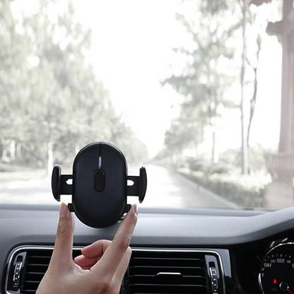 Belro car phone retractable mount holder attached to a vehicle dashboard, holding a smartphone securely for hands-free use.