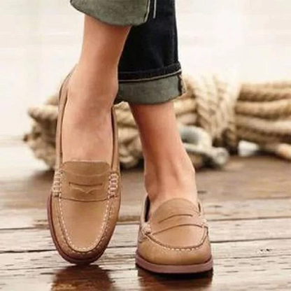 Women’s vintage slip-on loafers by Belro with low heels and PU leather, featuring a classic design and comfortable fit.
