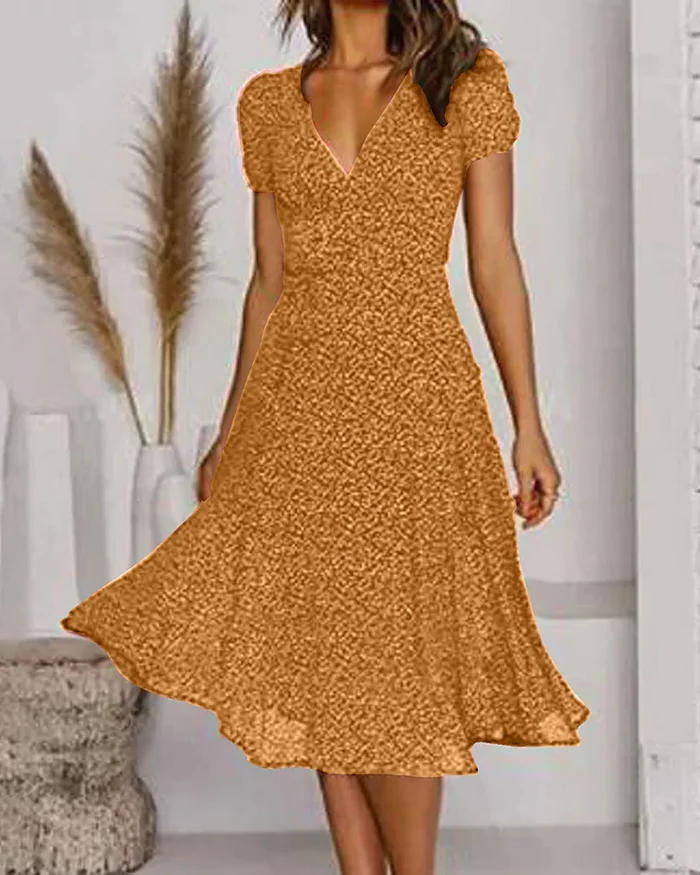 Belro floral print V-neck chiffon dress displayed on a hanger with a flowing, lightweight fabric and vibrant floral pattern.