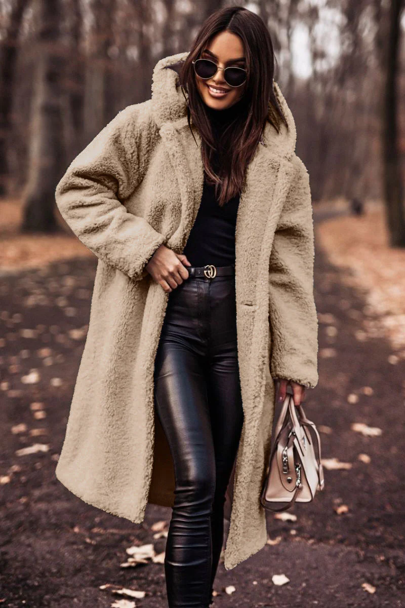 Belro winter coat displayed on a hanger, showcasing a warm, stylish jacket with a puffy design and cozy fabric for cold weather.