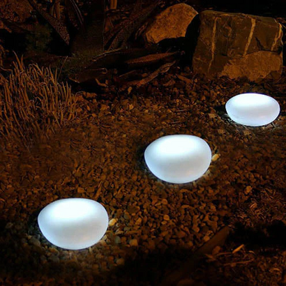 Belro Solar Pebble LED outdoor landscape light with sandblasted glass, ideal for garden and pathway illumination.
