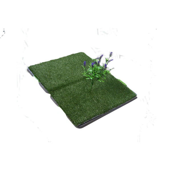 Artificial indoor grass from Belro, ideal for home decor, showing lush green grass on a flat surface.
