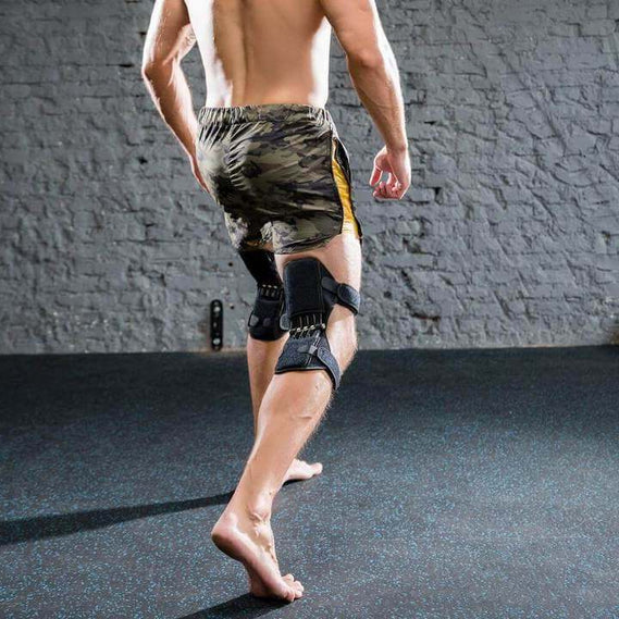 Belro Power Knee Stabilizer Pads attached to suspenders, providing support and compression for knee stabilization.