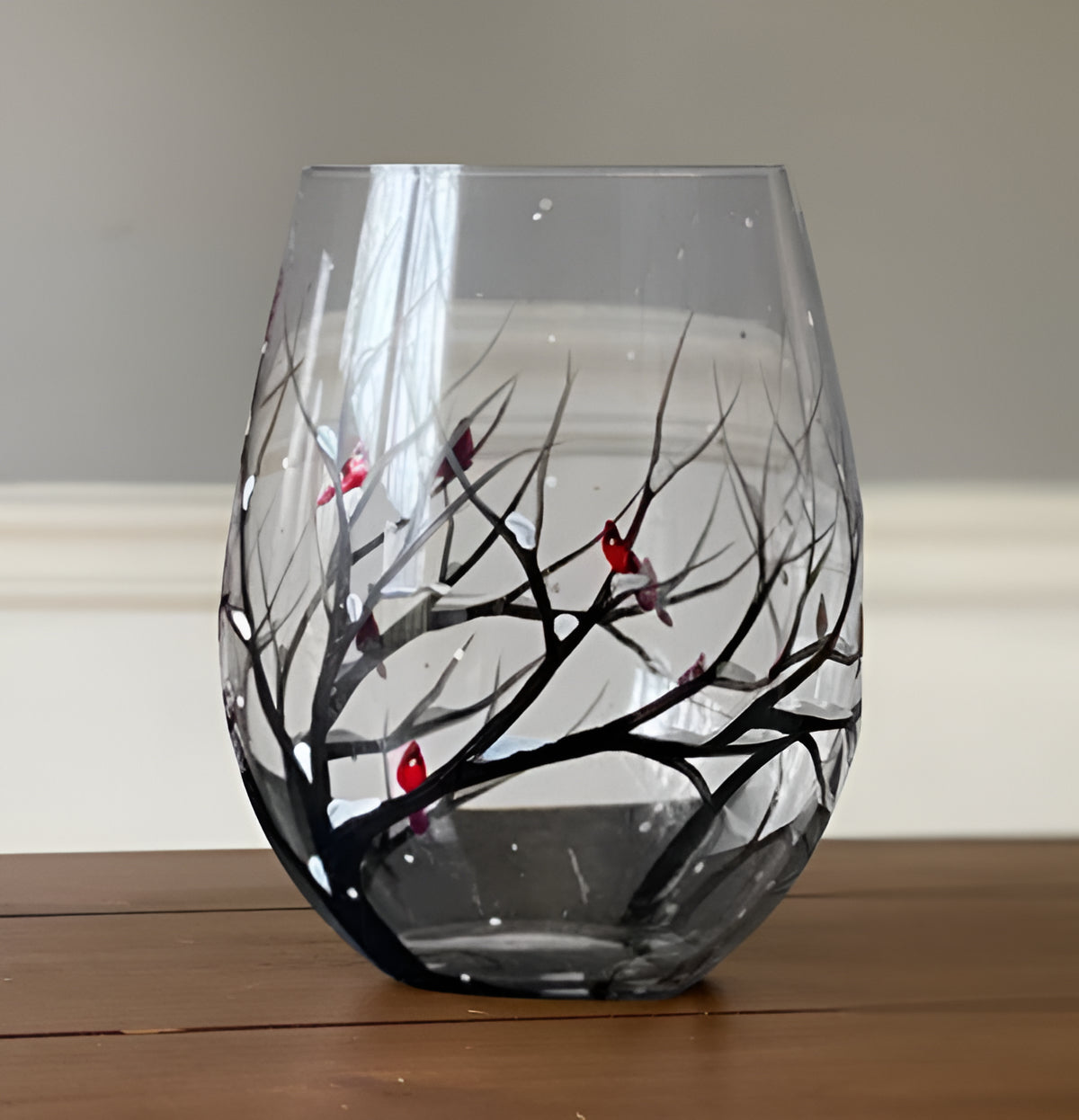 Hand-painted Four Seasons Tree wine glasses by Belro, featuring detailed artwork, perfect for elegant wine occasions.