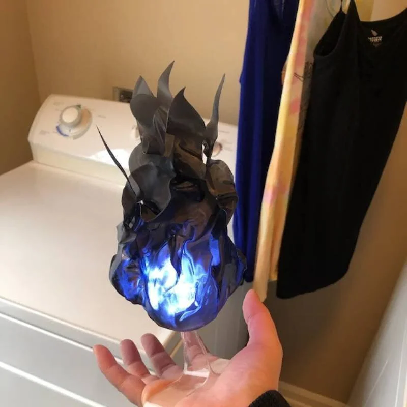Belro Halloween floating fireball prop with LED glow, outdoor garden ornament resembling a glowing fireball for spooky outdoor decor.
