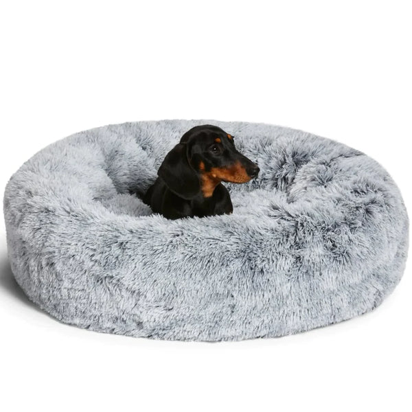 Belro calming dog bed with soft plush fabric, designed for comfort and relaxation for small and medium dogs.