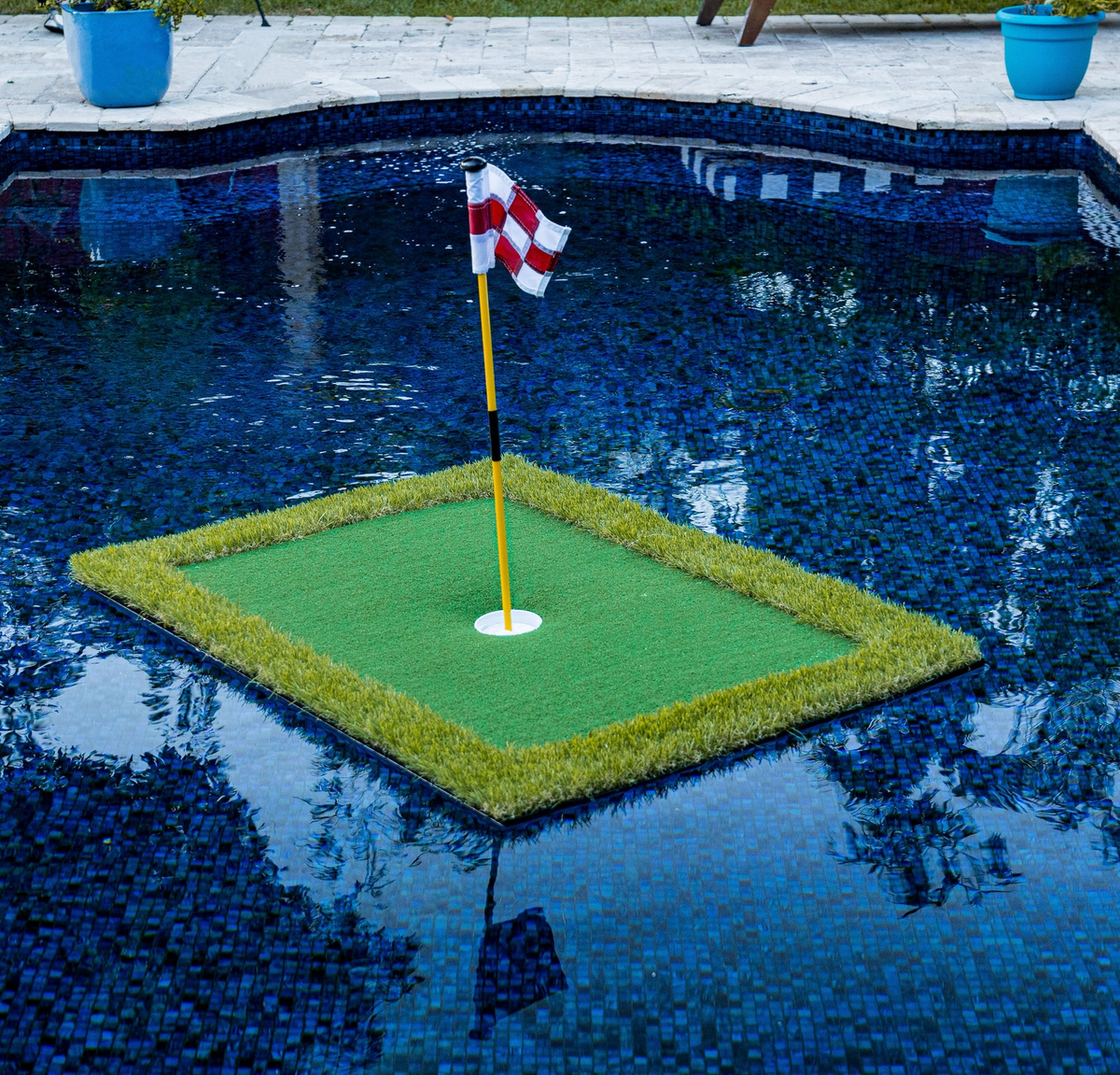 Floating golf putting green turf with Belro brand golf balls on outdoor lawn, designed for home golf practice and recreation.