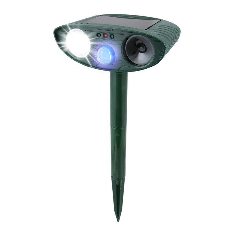 Belro Dog Outdoor Solar Ultrasonic Repeller in garden, showing device with solar panel and outdoor pest control setup