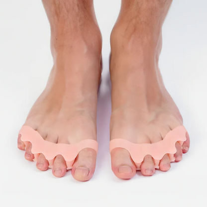 Belro orthopedic hammer toe splint positioned on a person's toe, designed to realign and support toe correction in health and beauty.
