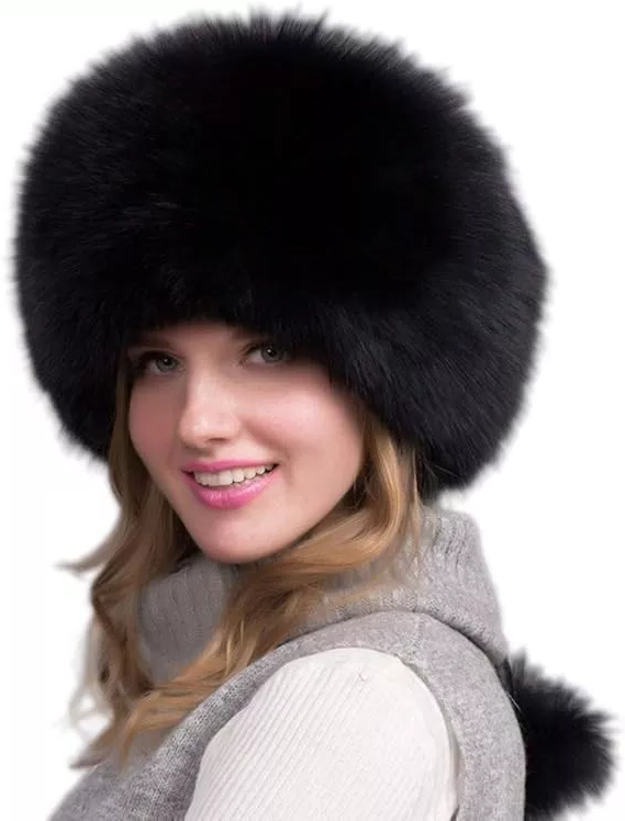 Women’s winter fox fur hat by Belro with thick fur and earmuffs, designed for warmth and fashion in cold weather.