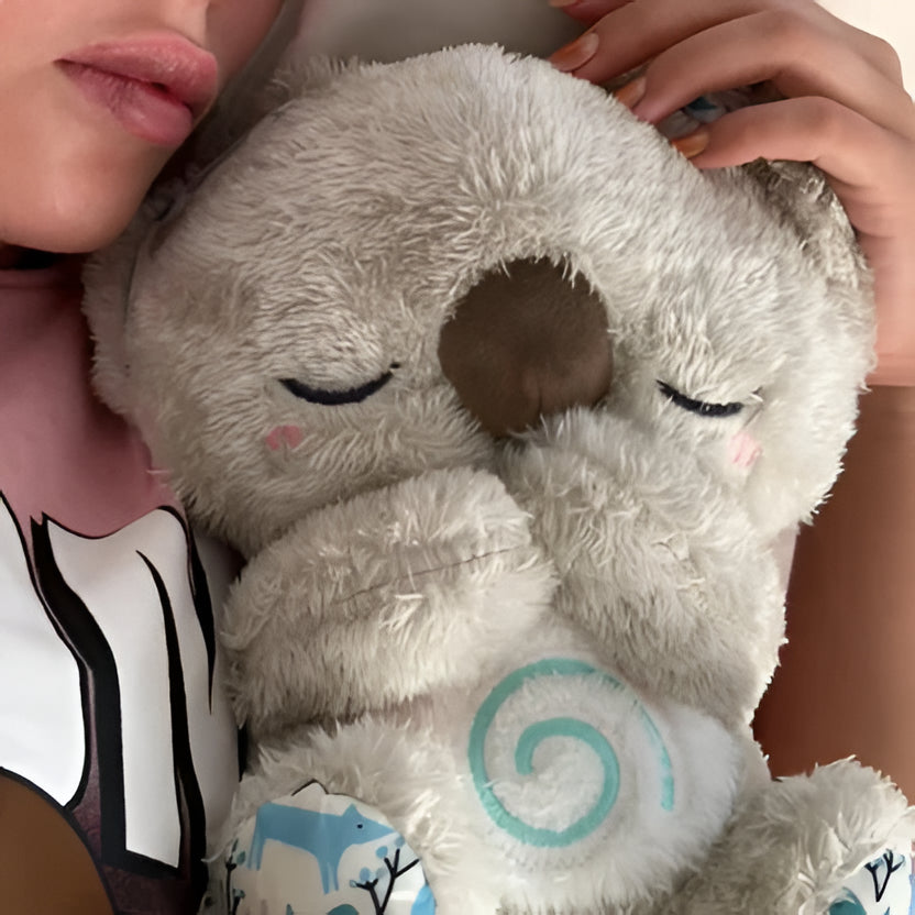 Belro Anxiety Relief Koala plush toy with music, lights, and rhythmic breathing motion for calming relaxation.