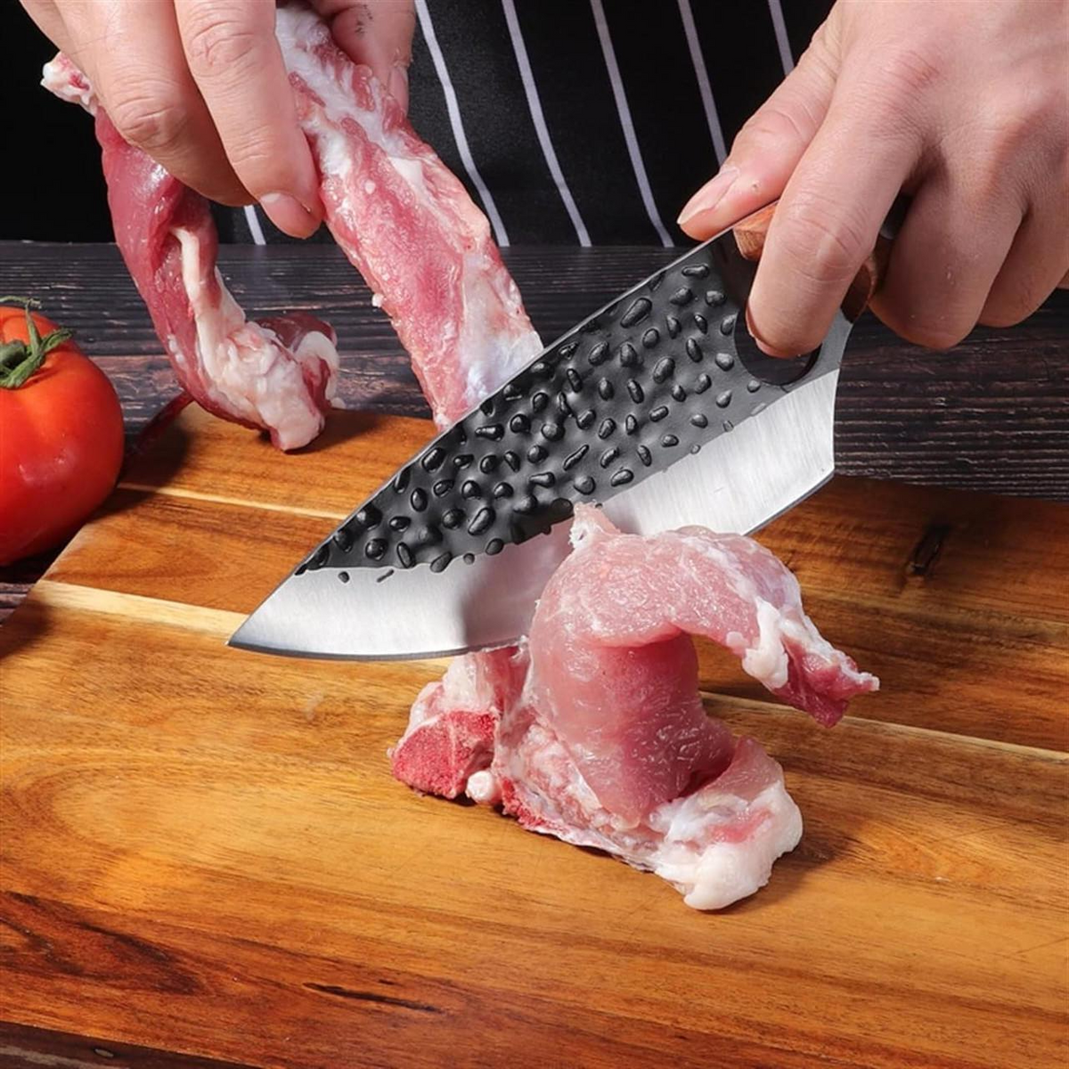Belro Japanese kitchen knife with a sharp stainless steel blade and black handle, ideal for precise slicing and chopping.