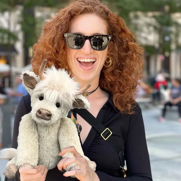 Scottish Highland Cattle plush toy by Belro, soft handmade stuffed animal featuring brown fur and iconic curved horns.