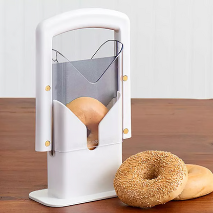 Belro stainless steel bagel slicer for small and large bagels, shown on a kitchen countertop with a sliced bagel.