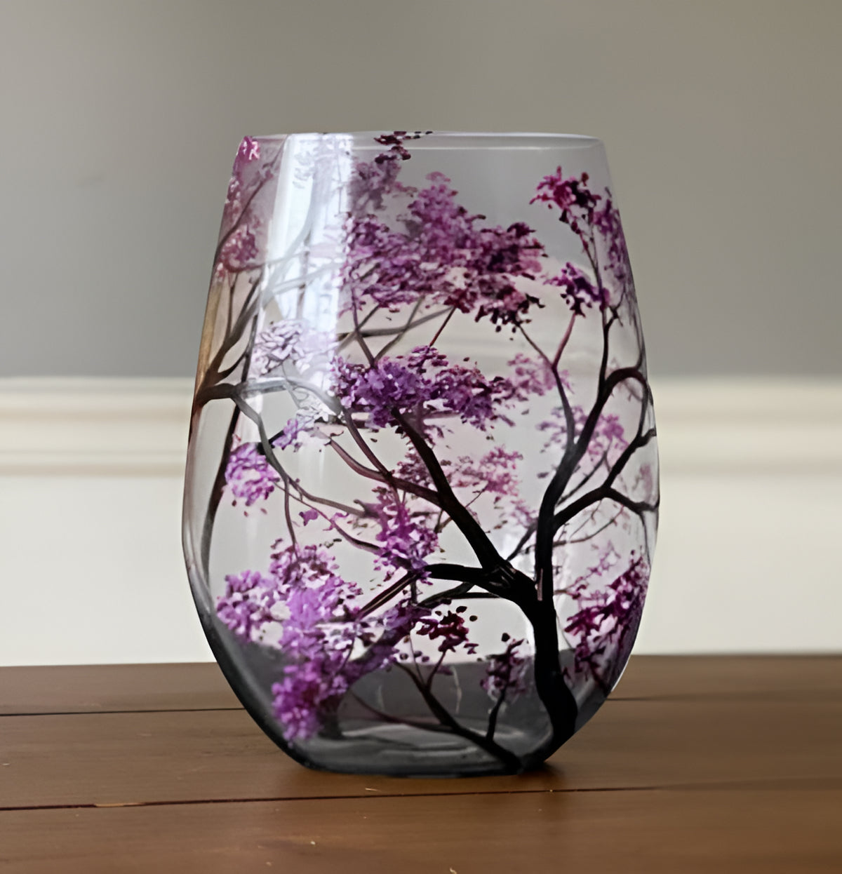 Hand-painted Four Seasons Tree wine glasses by Belro, elegant decorative glassware for wine tasting or display.