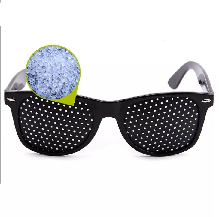 Belro corrective pinhole glasses with black frames, designed to improve vision, displayed on a white background