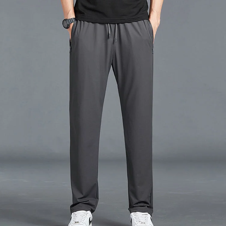 Men's Belro stretch quick dry hiking pants, activewear clothing, showing the lightweight fabric and relaxed fit for outdoor hiking.