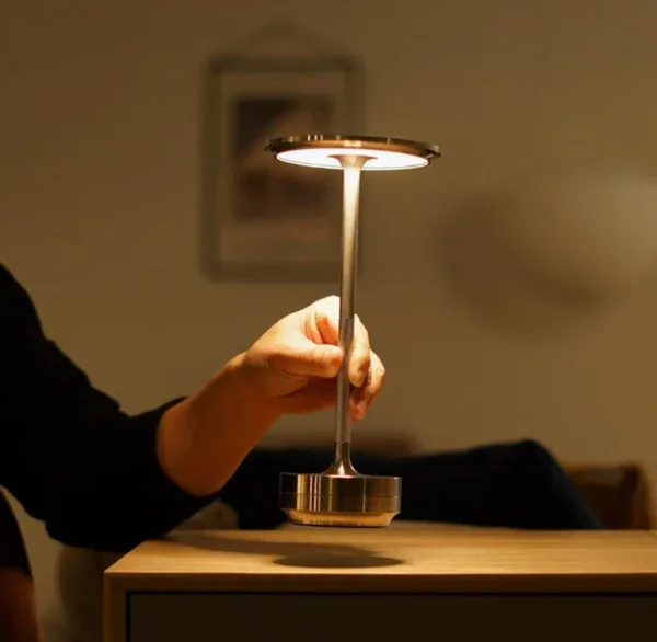 Belro wireless table lamp with soft glowing light, modern design, and touch control for cozy nighttime illumination.