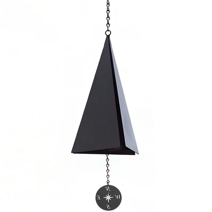 Belro Door County Wind Bell hanging outdoors with a rustic finish, adding charming decor to a home or garden setting.