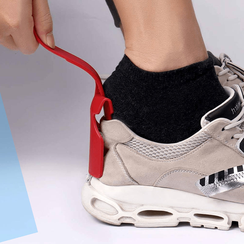 Belro Clip-N-Slip easy lazy shoe horn with clip, shown in use for slipping on shoes effortlessly, perfect for dressing assistance.