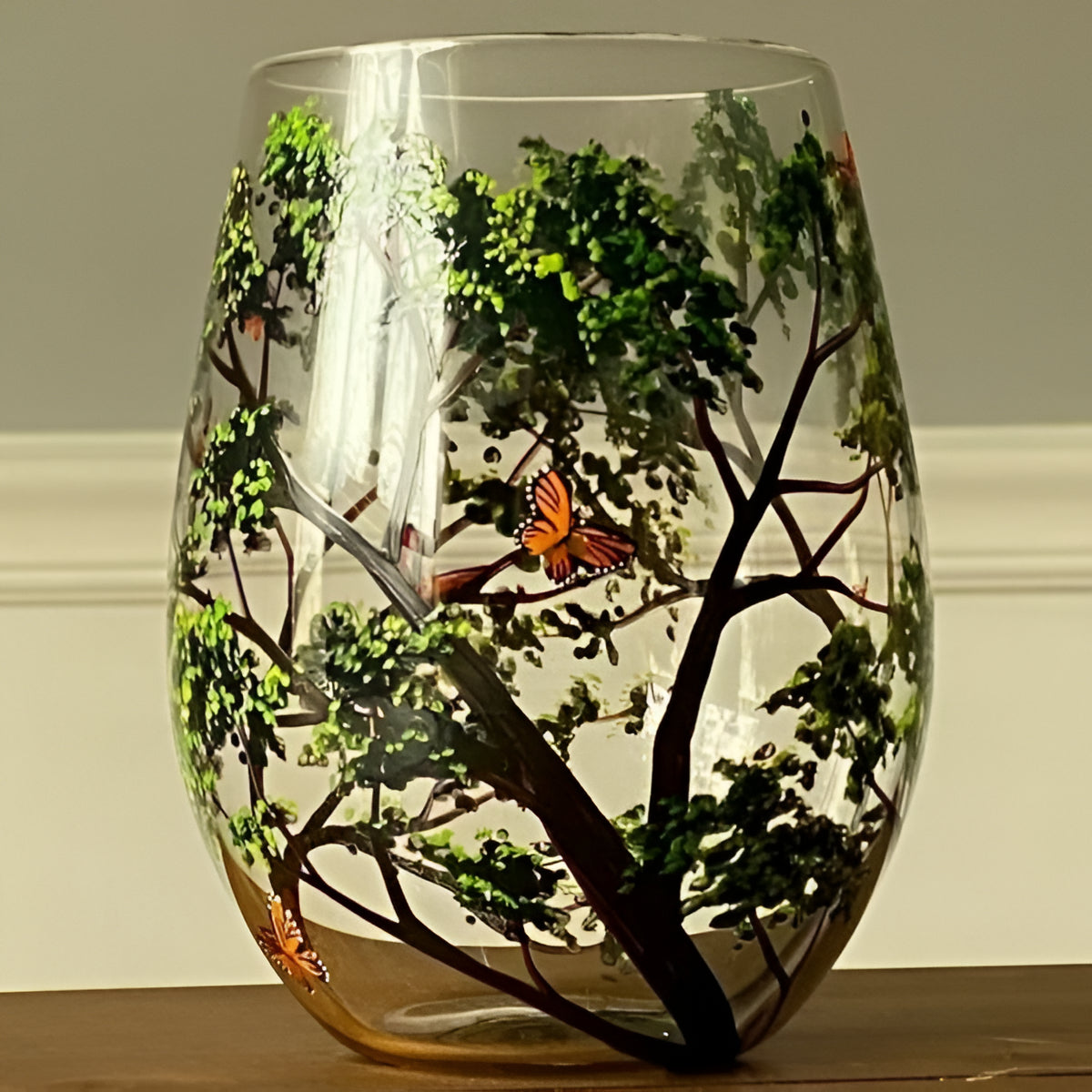 Hand-painted Four Seasons Tree wine glasses by Belro, elegant glassware accessory with colorful seasonal artwork.