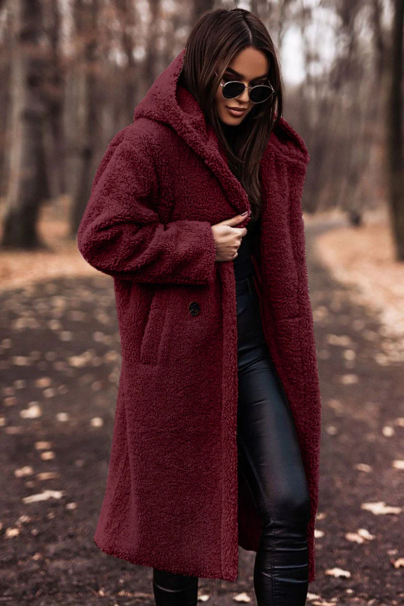 Belro winter coat with warm, stylish design, featuring a hood, zip closure, and cozy fabric for cold weather.
