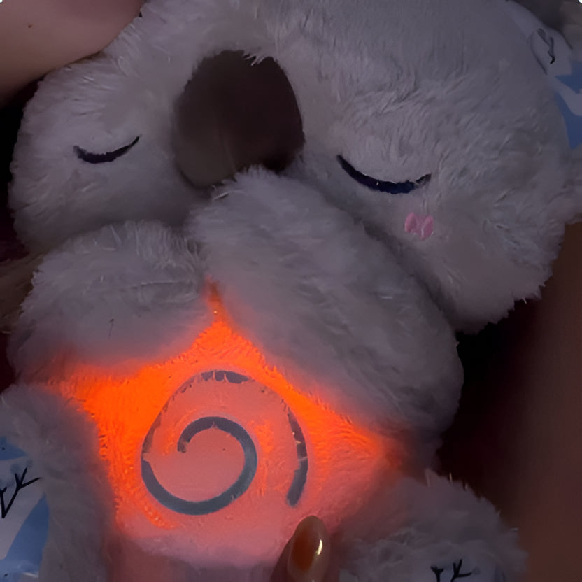 Belro Anxiety Relief Koala plush toy with music, lights, and rhythmic breathing motion for calming relaxation.