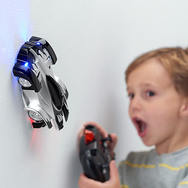 Belro Ultimate Wall Climbing Remote Control Car climbing a wall, showcasing its toy design and compact size for kids and hobbyists.