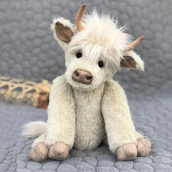 Belro Scottish Highland Cattle plush toy, soft and detailed, perfect for display or collection, showcasing its fluffy brown and beige fur.