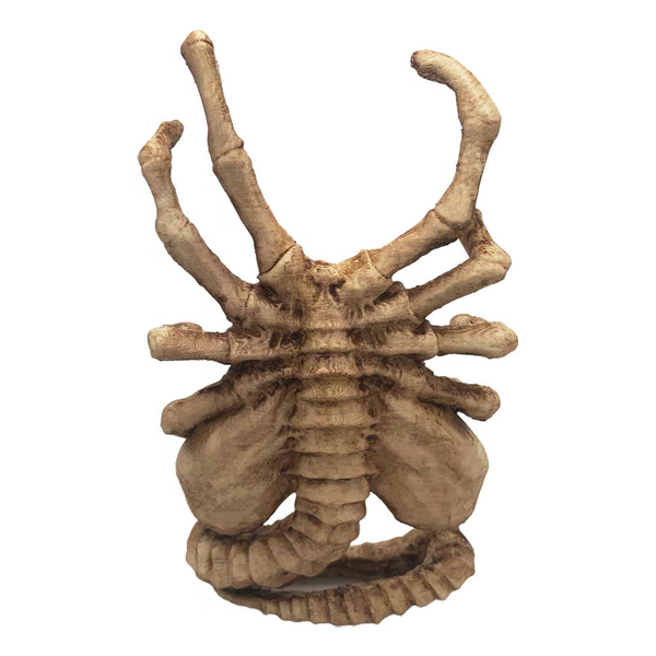 Belro Horrible Facehugger phone holder attached to a phone, showcasing a quirky, horror-themed phone mount accessory.