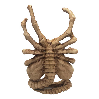 Belro Horrible Facehugger phone holder attached to a phone, showcasing a quirky, horror-themed phone mount accessory.