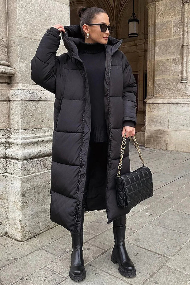 Long quilted winter coat by Belro featuring a warm, elegant design with a high collar and stylish stitching.