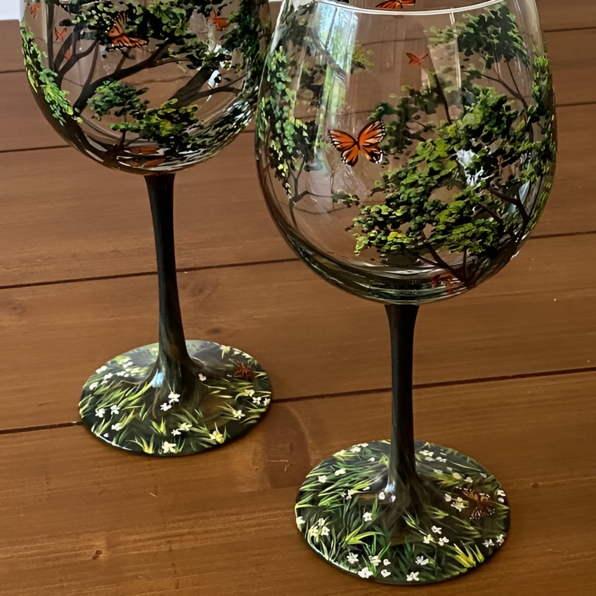 Hand-painted Four Seasons Tree wine glasses by Belro, elegant glassware accessories with colorful seasonal artwork.