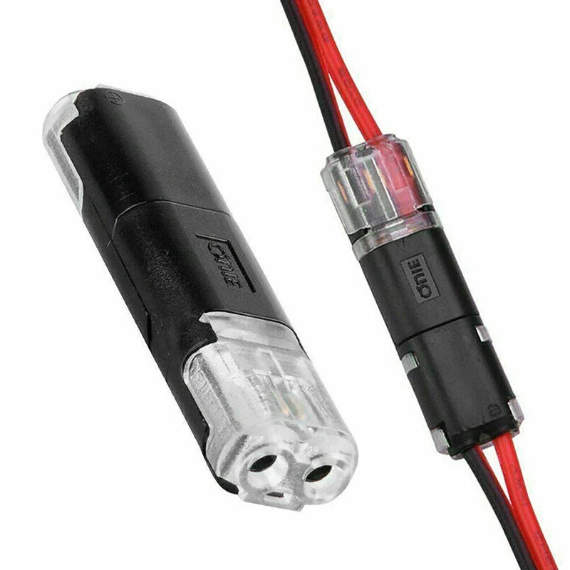 Belro double-wire push-in connector with locking buckle for electronics, showing the connector with wires securely inserted.