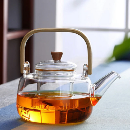 Heat-resistant borosilicate glass teapot by Belro with a clear design, perfect for boiling tea in a home kitchen setting.