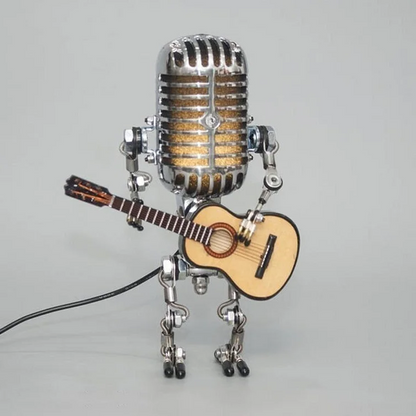 Vintage Metal Microphone Robot with Guitar Lamp by Belro, featuring retro-style microphone and illuminated guitar lamp in a decorative display.