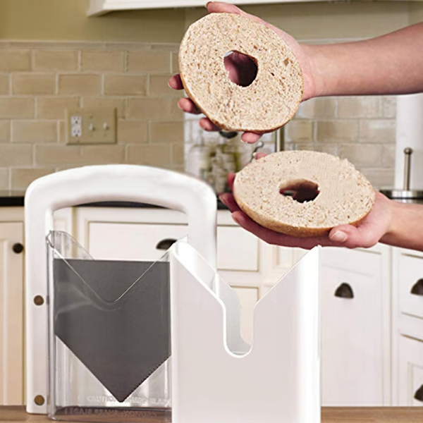 Belro stainless steel bagel slicer for small and large bagels, designed for safe, even slices in kitchen and dining setup.