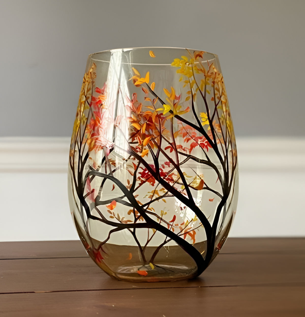 Hand-painted Four Seasons Tree wine glasses by Belro, elegant glassware with colorful seasonal artwork for wine enjoyment.